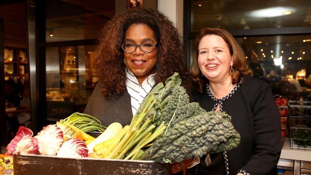 Oprah Winfrey and True Food Kitchen CEO Christine Barone at the True Food Kitchen Winter Harvest Community Dinner in Pasadena, California.