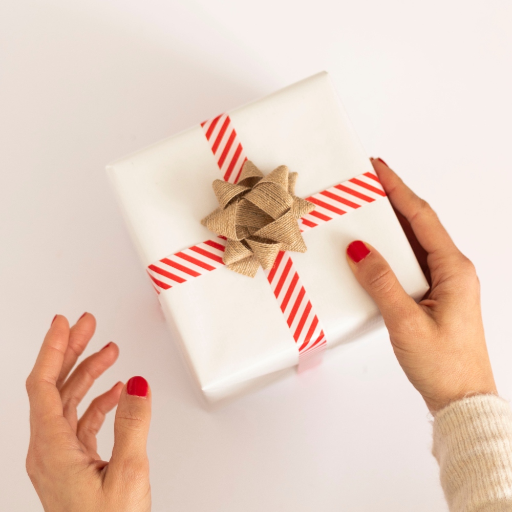 A person holding a present