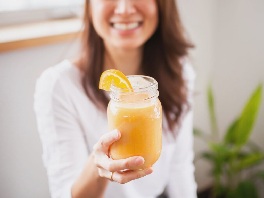woman with healthy drink