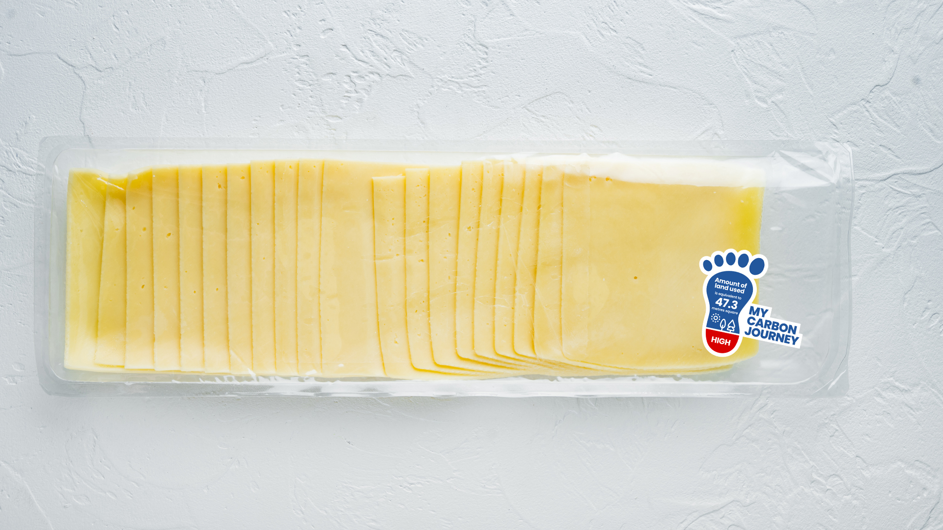 Cheddar cheese vacuum pack, on white background Green Queen